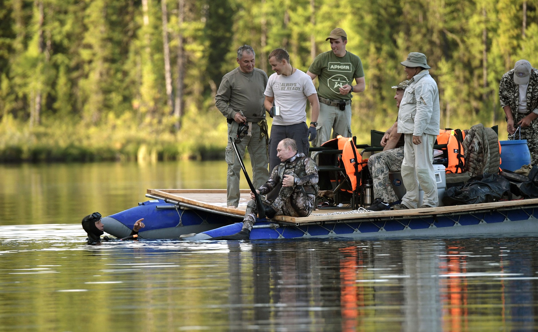 Putin in wetsuit preparing to get in water