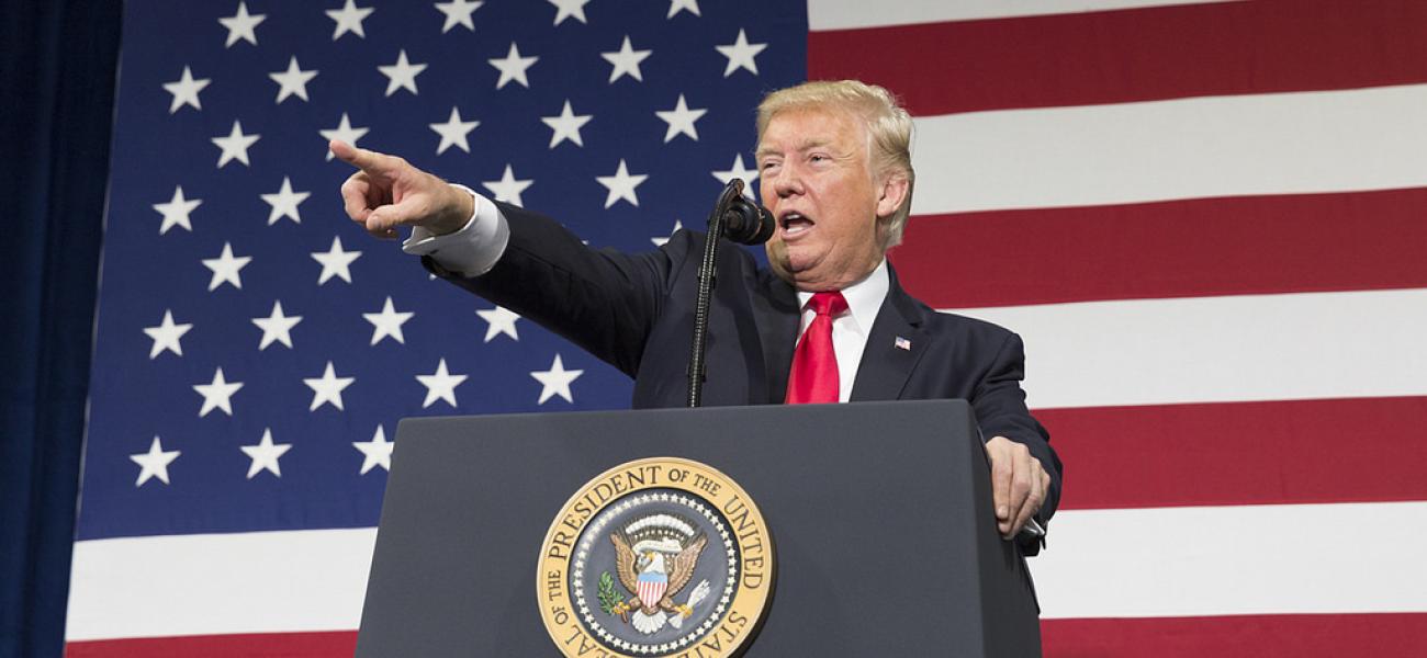 U.S. President Donald Trump at podium. 