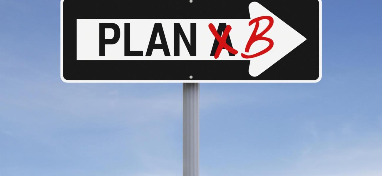 A one-way arrow saying "Plan A" with the "A" crossed out and a "B" written in in red instead.