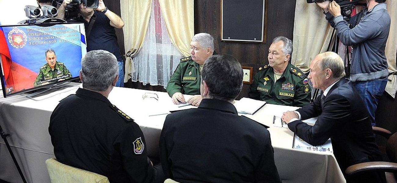 Defense Minister Sergei Shoigu briefs President Vladimir Putin on the Vostok-2014 military exercises via video linkup, Sept. 23, 2014.