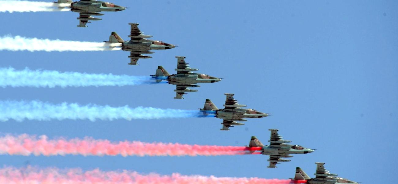 Russian military planes draw the Russian flag in the sky at the 2016 Victory Day Parade. 
