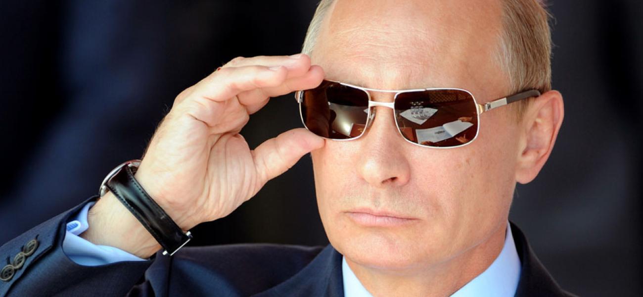 Russian President Vladimir Putin wearing sunglasses.