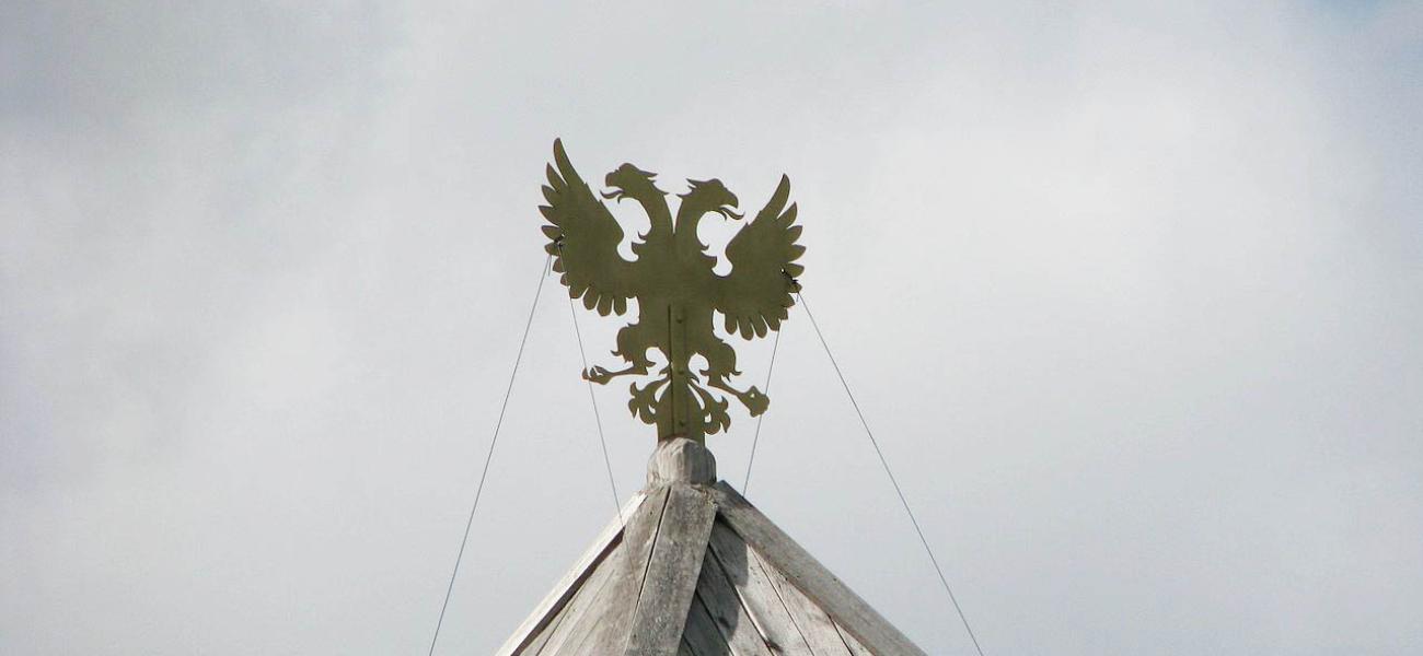 Russian double-headed eagle against the sky.