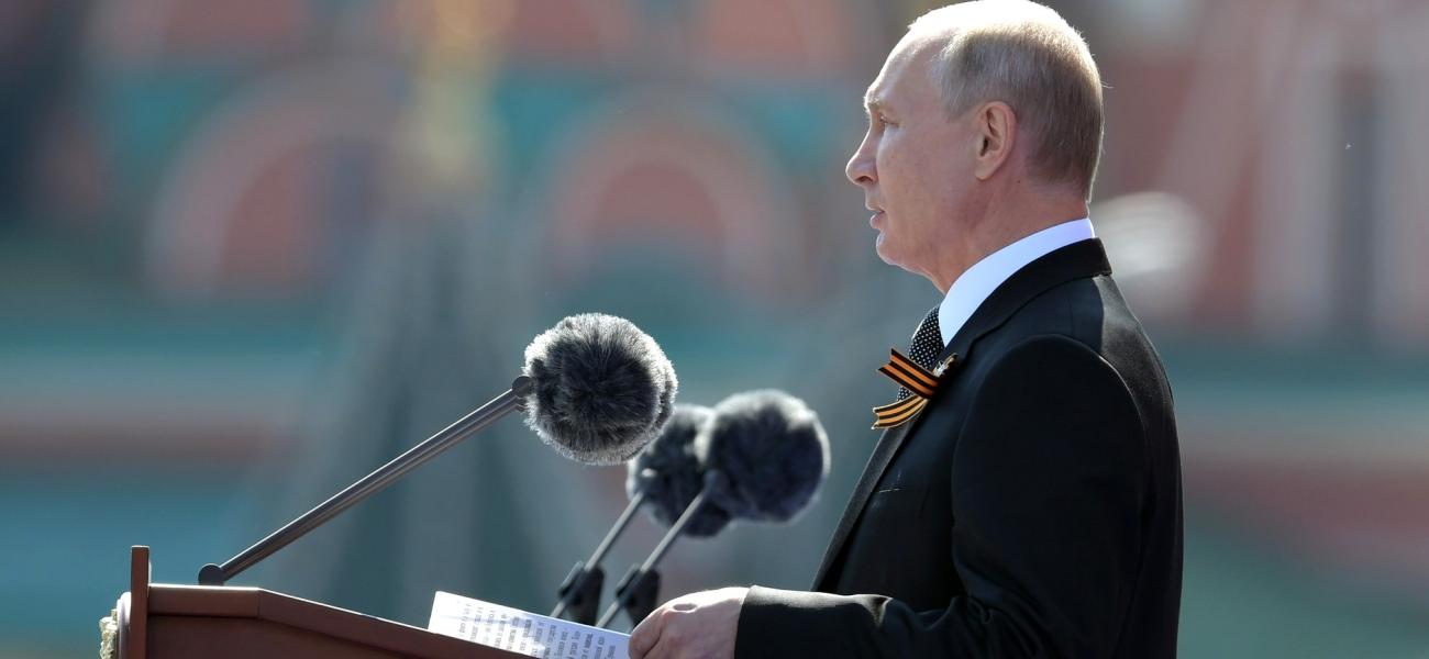 Vladimir Putin at podium, Victory Day 2020 parade.